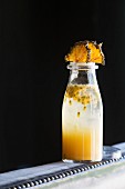 Cocktail 'Pineapple Passion Fruit Summer Cup' aus der 'Bryk Bar' in Berlin