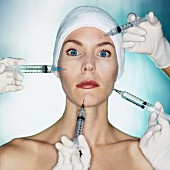 A woman receiving injections - a symbol of beauty operations