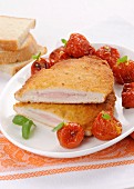 Stuffed turkey breast with oven-roasted tomatoes