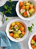 Fruit salad with pineapple, passion fruit and kiwi