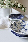 Blue-and-white crockery and white spring flowers
