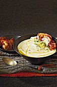 Cauliflower and Parmesan soup with crispy bacon