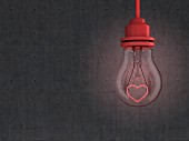 Light bulb with red heart-shaped filament in front of concrete wall - 3D rendering