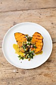 Grilled sweet potatoes with pistachio nuts and coriander
