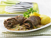 Beef roulade with a courgette medley and potatoes