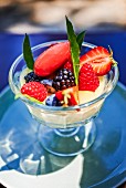 Vanilla cream with berries and ice cream