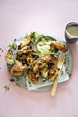 Marinated chicken wings with avocado and herb mayonnaise