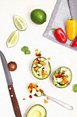 White fish ceviche with cucumber, peppers and coriander served in an avocado