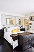 Black and white bedroom with yellow accents