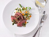 Saddle of venison with vegetable risotto