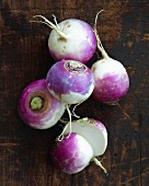 Turnips on a wooden surface