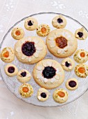 Jam biscuits with flaked almonds