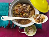 Sauerkraut stew with beef, mushrooms and gherkins