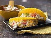 Tacos filled with sheep's cheese, sweetcorn and cocktail tomatoes