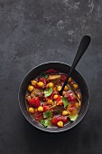 Oriental lamb stew with chickpeas and tomatoes