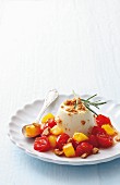 Panna cotta with rosemary and apricot & cherry tomato compote