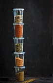 Barbecue spices in stacked plastic containers