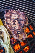 Rib-eye steak on the barbecue