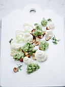 Yoghurt mousse with cucumber sorbet and roasted hazelnuts