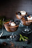 Chocolate mousse with blackberries and cream