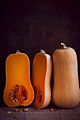 Butternut squashes, whole and halved