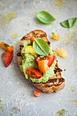 Bruschetta with avocado and colourful tomatoes