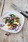 Smoked tofu with chard and red onions