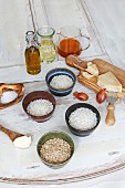 Assorted varieties of risotto rice in bowls with ingredients