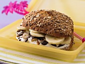A banana roll with quark, chocolate and nuts