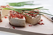 Cream cheese with dried tomatoes and chives