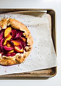 A galette with peaches and plums