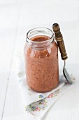 Strawberry & banana smoothie in a screw-top jar