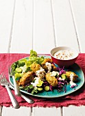 Carrot and cumin falafel with yoghurt and salad