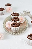 Rose cupcakes on a silver tray