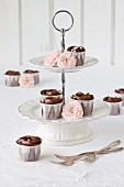 Chocolate cupcakes on a cake stand