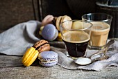 Assorted home-made macarons and glasses of coffee