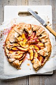 A nectarine galette with a slice removed (seen from above)
