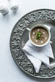 Mushroom cream soup with parsley and dried mushrooms