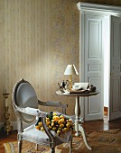 Panelled door, Baroque chair and side table in classic interior