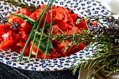 Tomato salad with basil and rosemary