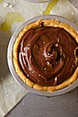 A chocolate & budino tartlet with olive oil and sea salt