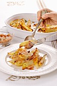 Patate al forno condite (oven-roasted potatoes with onion, Italy)