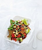 A superfood snack: home-made nachos with bean & avocado salsa