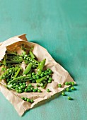Fresh peas in a paper bag