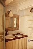 Rustic bathroom in natural shades with curtain below washstand