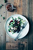 Leaf salad with blueberries, blackberries, beetroot, edible flowers, roasted almonds and red wine vinegar & onion vinaigrette