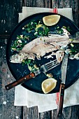 Poached trout with fresh lemon, capers and salsa verde