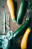 Green and yellow courgette, fresh thyme and bay leaves