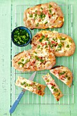 Wholemeal tarte flambée with cream cheese, onion and ham