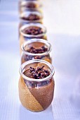Chocolate & caramel cream in glass jars